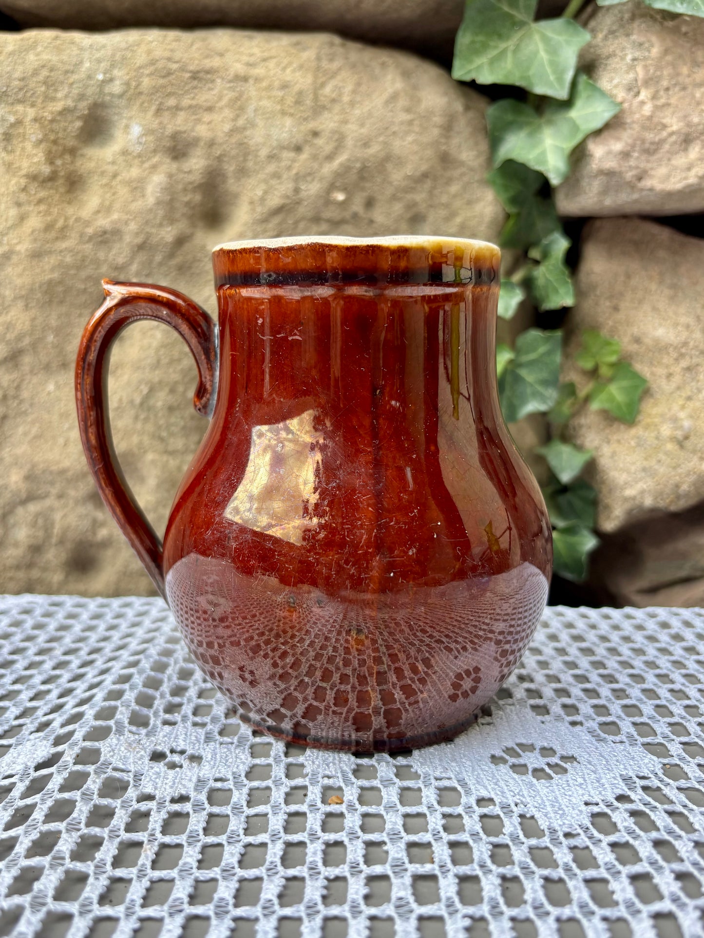 pot a lait faillence emaillee 1950  vue de dos