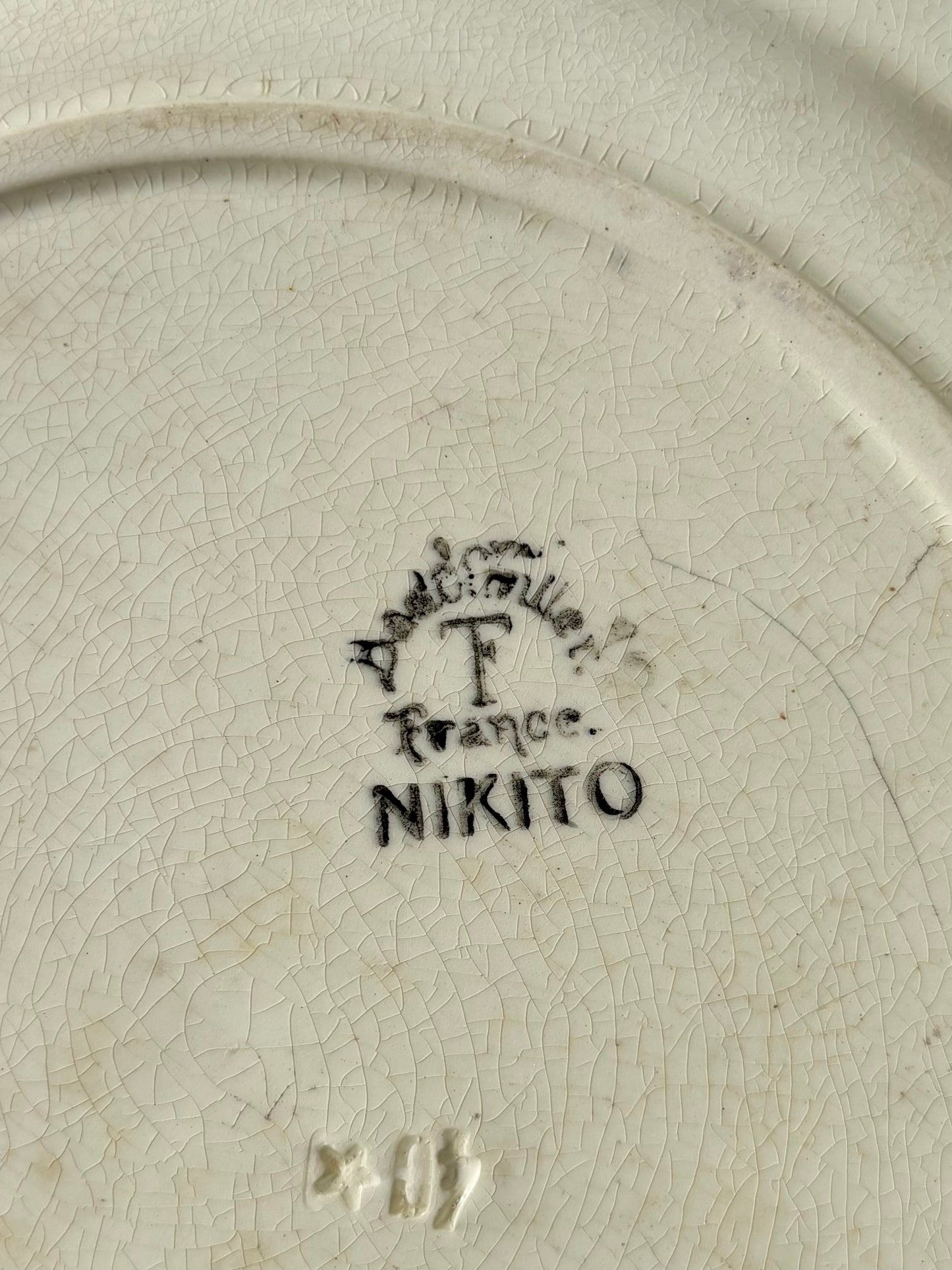 Signature Badonviller France 1900 Nikito faïence ancienne