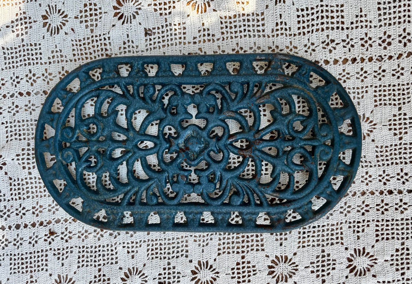 Dessous de plat en fonte