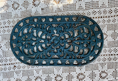 Dessous de plat en fonte
