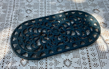 Dessous de plat en fonte